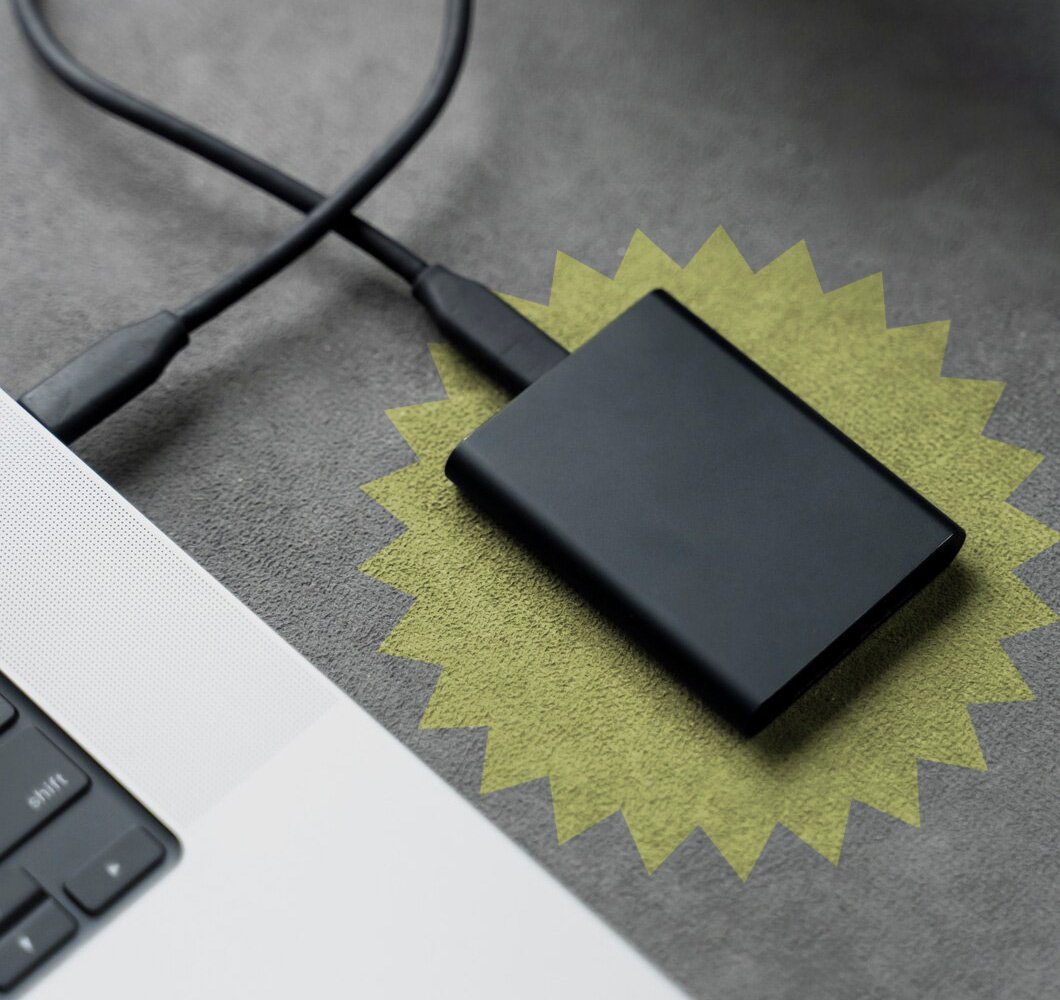 External-Harddisk.Laying-besides-Laptop