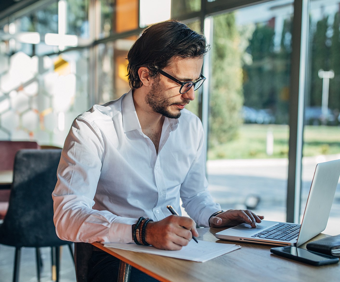 Guy-working-at-a-cafe